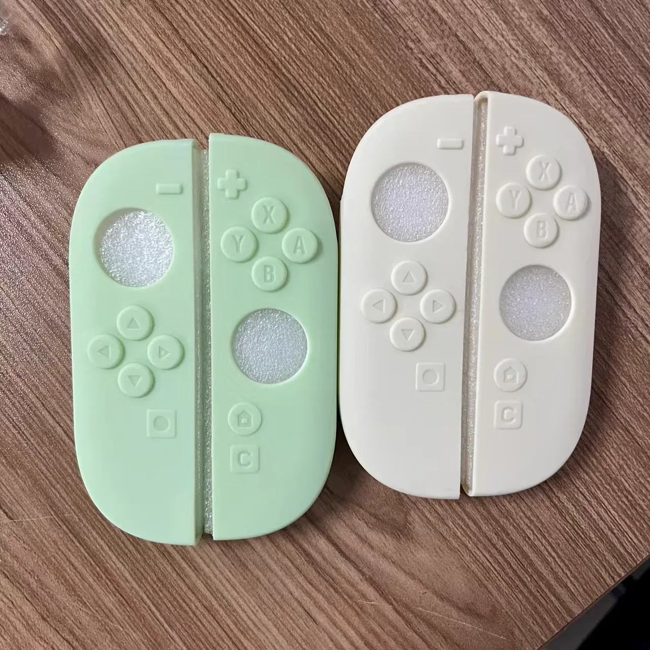 Mint green and cream full-cover shells for Nintendo Switch 2 Joy-Con controllers