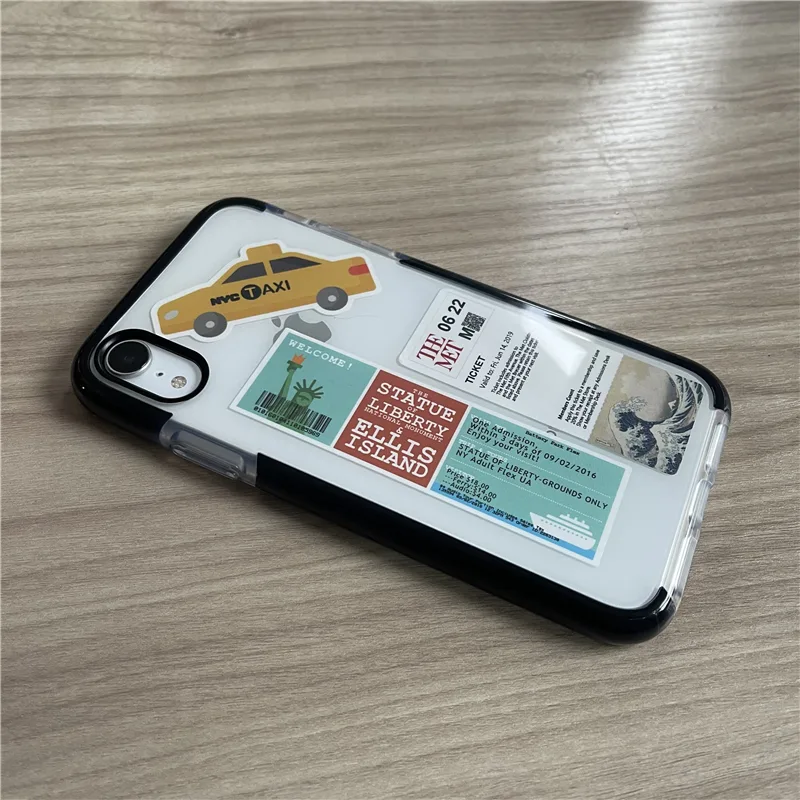 Clear phone case with a printed taxi and city-sticker collage, held in a hand