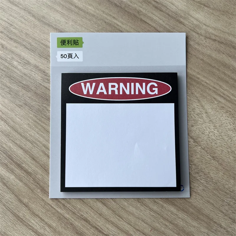 Sticky note pad with a printed cover, shrink-wrapped with a backing card